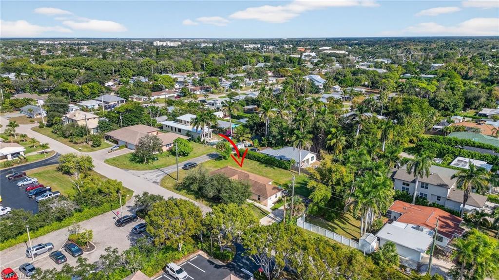 3920 10th Street North Naples, FL 34103 - Photo 44 of 47 Aerial view of property and surrounding area with nearby suburban area