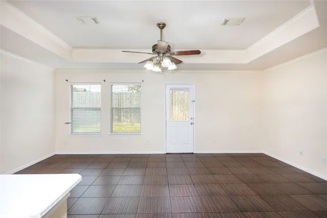 a view of an empty room with a window