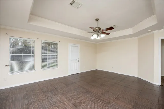 wooden floor that has a window in it