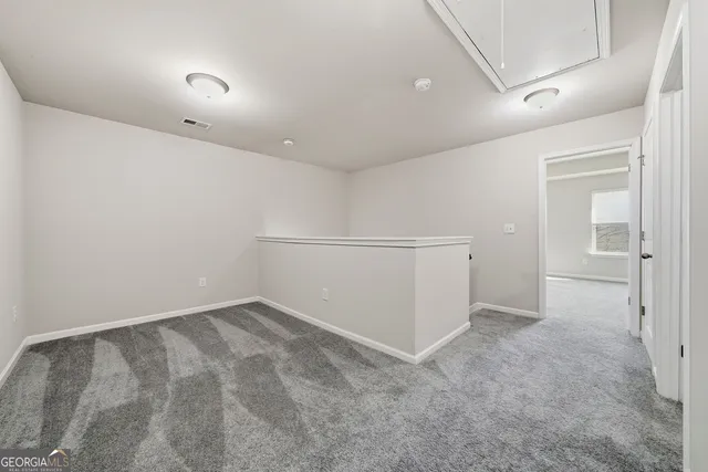 an empty room with a natural light