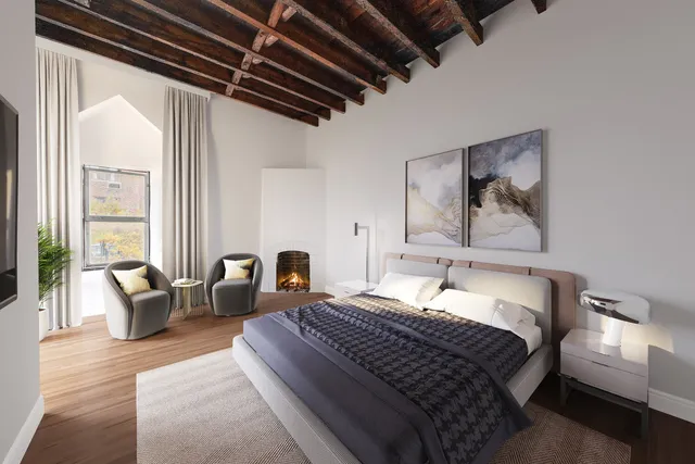 a bedroom with a bed and a couch