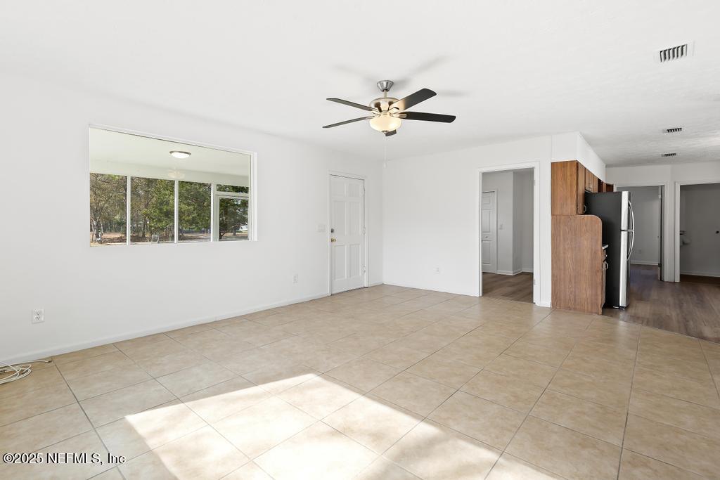 54074 Charles Street Callahan, FL 32011 - Photo 14 of 52 a view of an empty room with a window