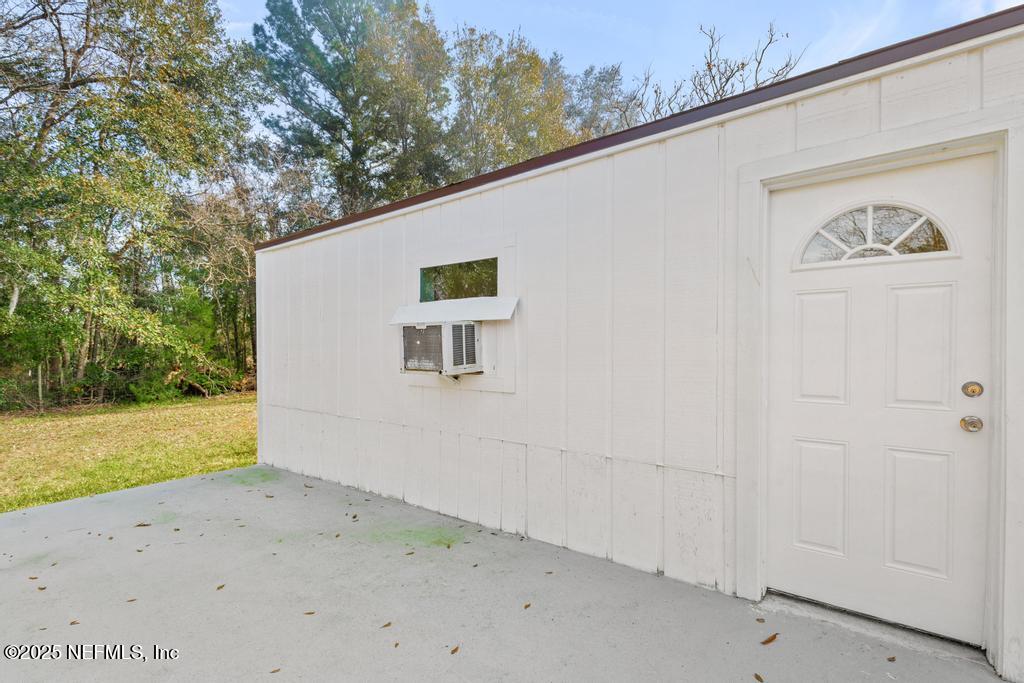 54074 Charles Street Callahan, FL 32011 - Photo 44 of 52 a view of back yard of the house