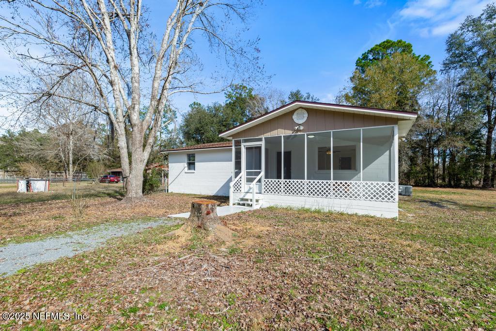 54074 Charles Street Callahan, FL 32011 - Photo 5 of 52 a view of a house with a yard
