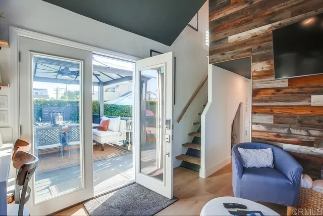 a bedroom with a large bed and a large window