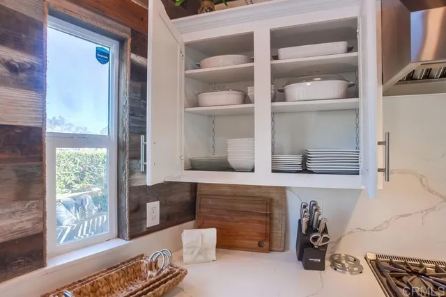 a bedroom with bed and window