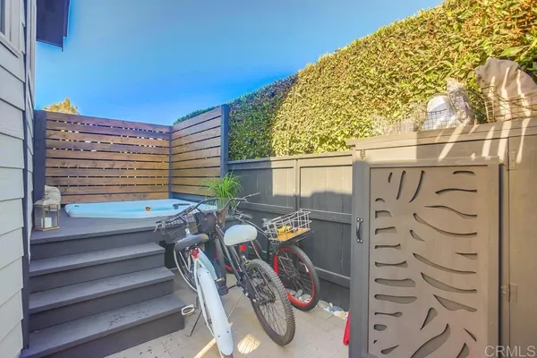 a view of a chairs and table in the patio