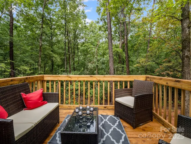 a view of a two chairs in the deck
