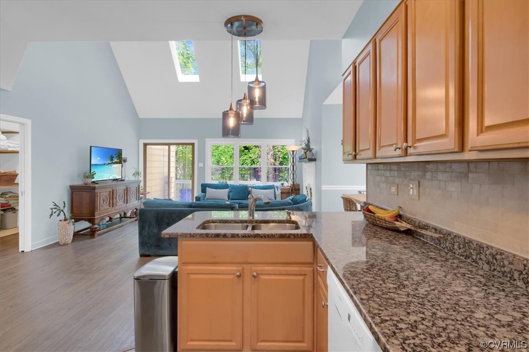 7121 Pointer Ridge Road Midlothian, VA 23112 - Photo 21 of 50 a kitchen with a stove a sink a counter space and a window