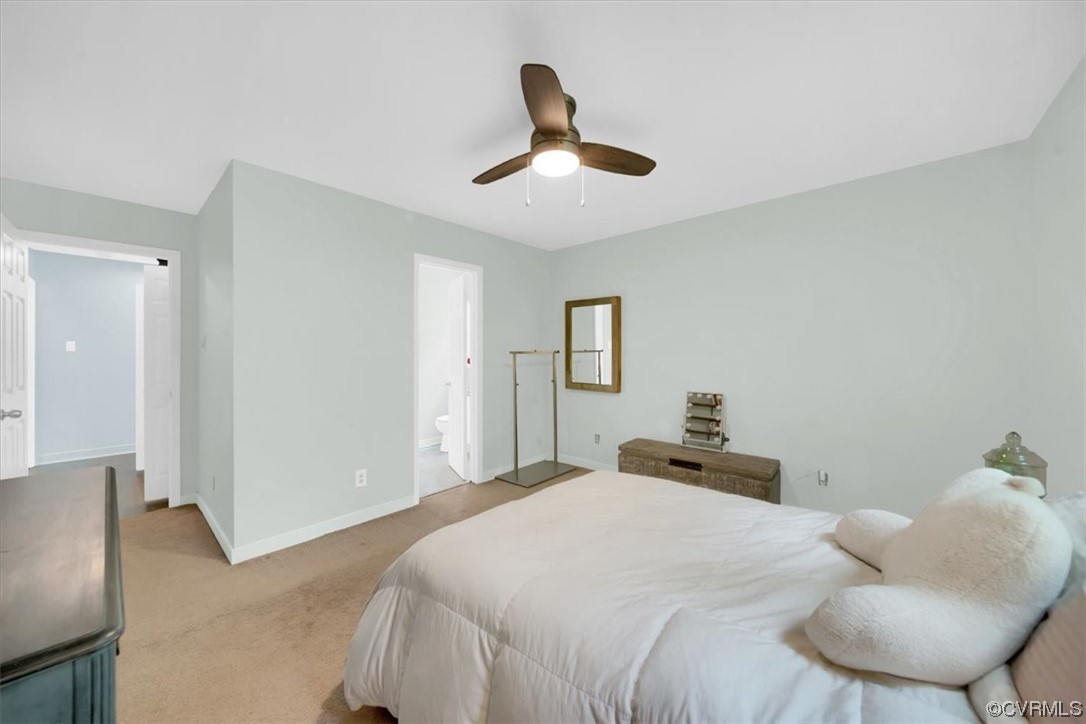 7121 Pointer Ridge Road Midlothian, VA 23112 - Photo 28 of 50 a bedroom with a bed and a chair