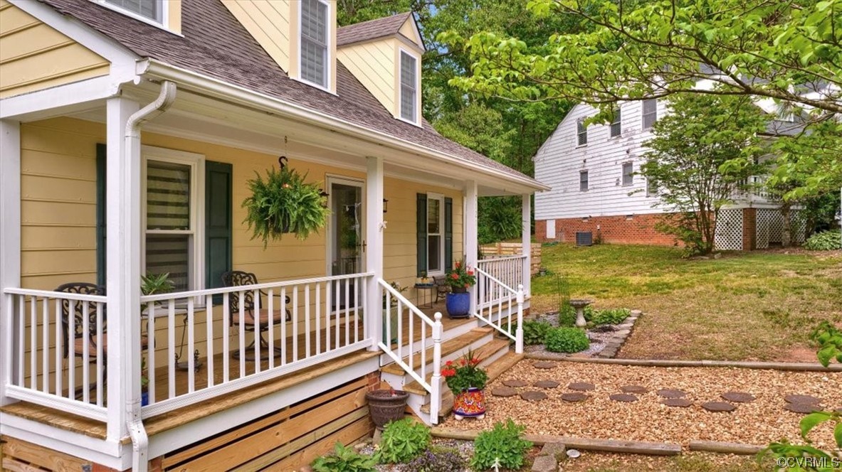 7121 Pointer Ridge Road Midlothian, VA 23112 - Photo 4 of 50 a view of a house with backyard wooden floor and fence