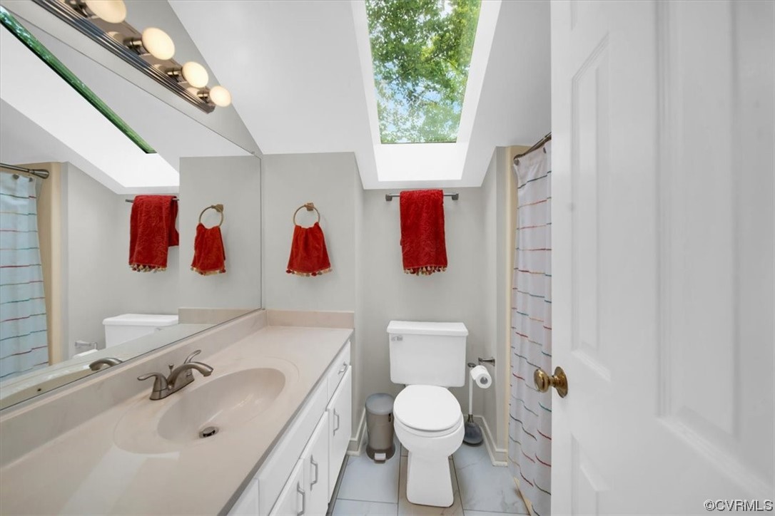 7121 Pointer Ridge Road Midlothian, VA 23112 - Photo 42 of 50 a bathroom with a sink toilet and mirror