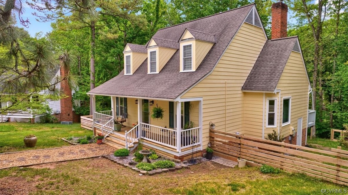 7121 Pointer Ridge Road Midlothian, VA 23112 - Photo 6 of 50 a front view of a house with garden