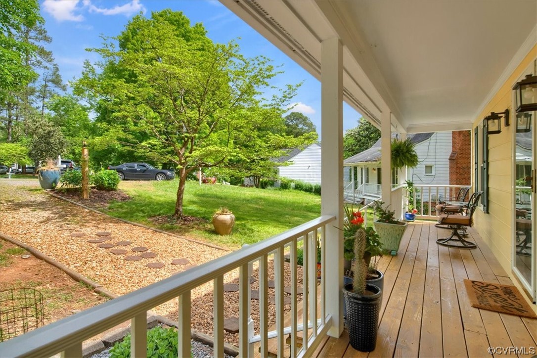 7121 Pointer Ridge Road Midlothian, VA 23112 - Photo 8 of 50 a view of a porch with chairs and backyard