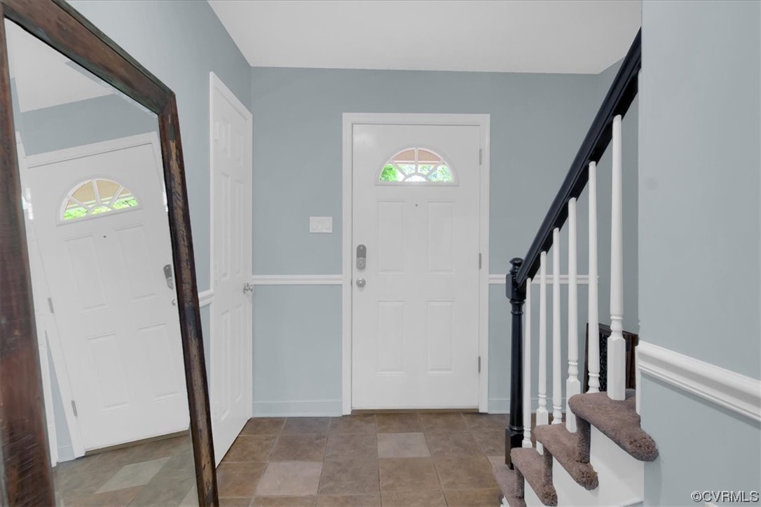 7121 Pointer Ridge Road Midlothian, VA 23112 - Photo 10 of 50 a view of an entryway with wooden floor and door