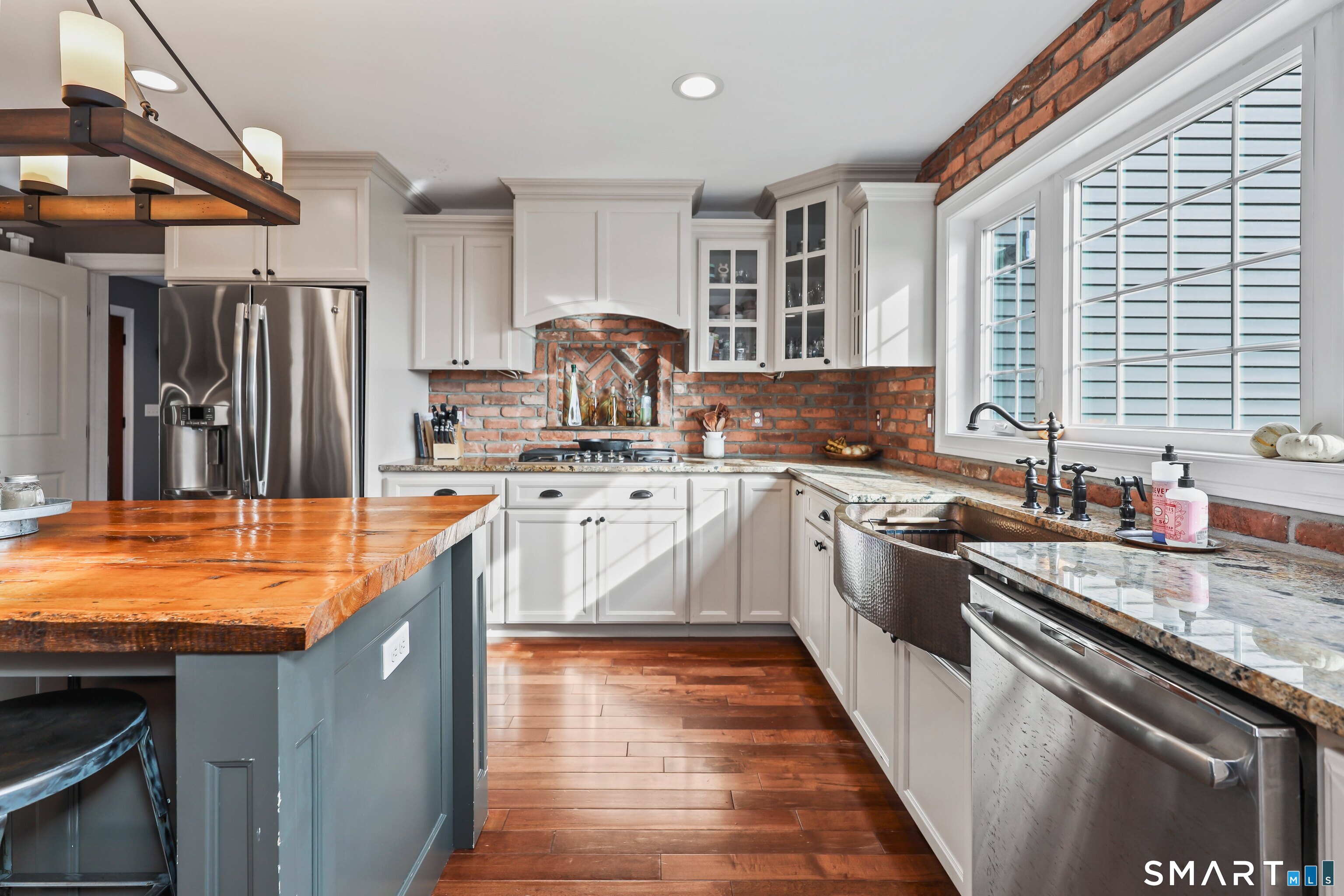195 Hinman Road Watertown, CT 06795 - Photo 16 of 39 a kitchen with stainless steel appliances granite countertop sink stove top oven and cabinets