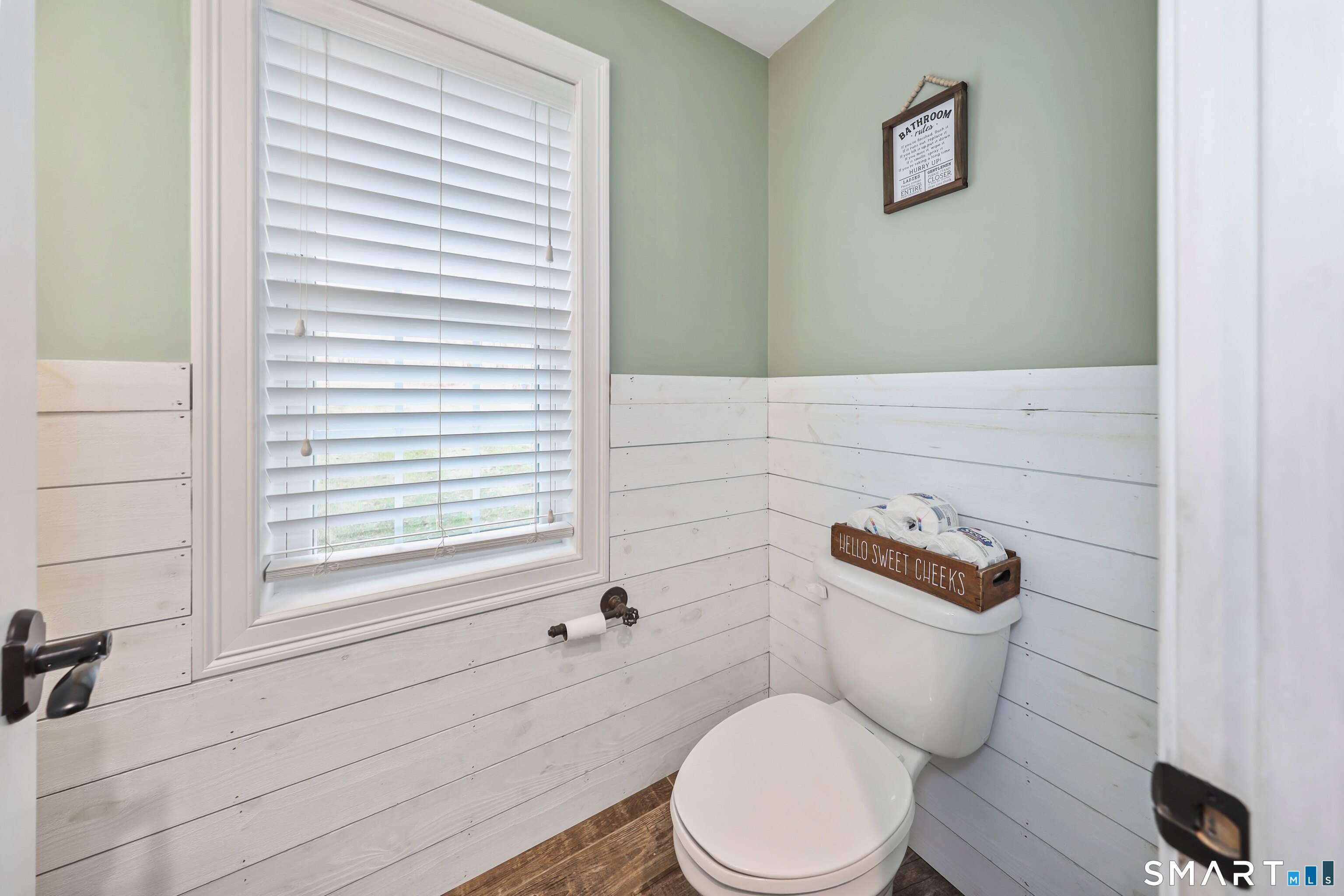 195 Hinman Road Watertown, CT 06795 - Photo 18 of 39 a white toilet sitting next to a bathroom sink