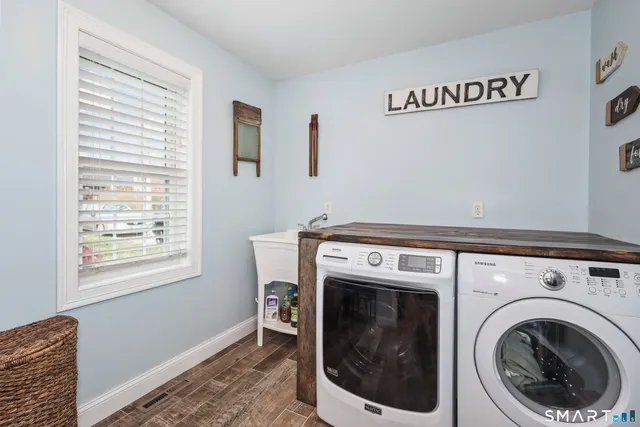 a utility room with dryer and washer