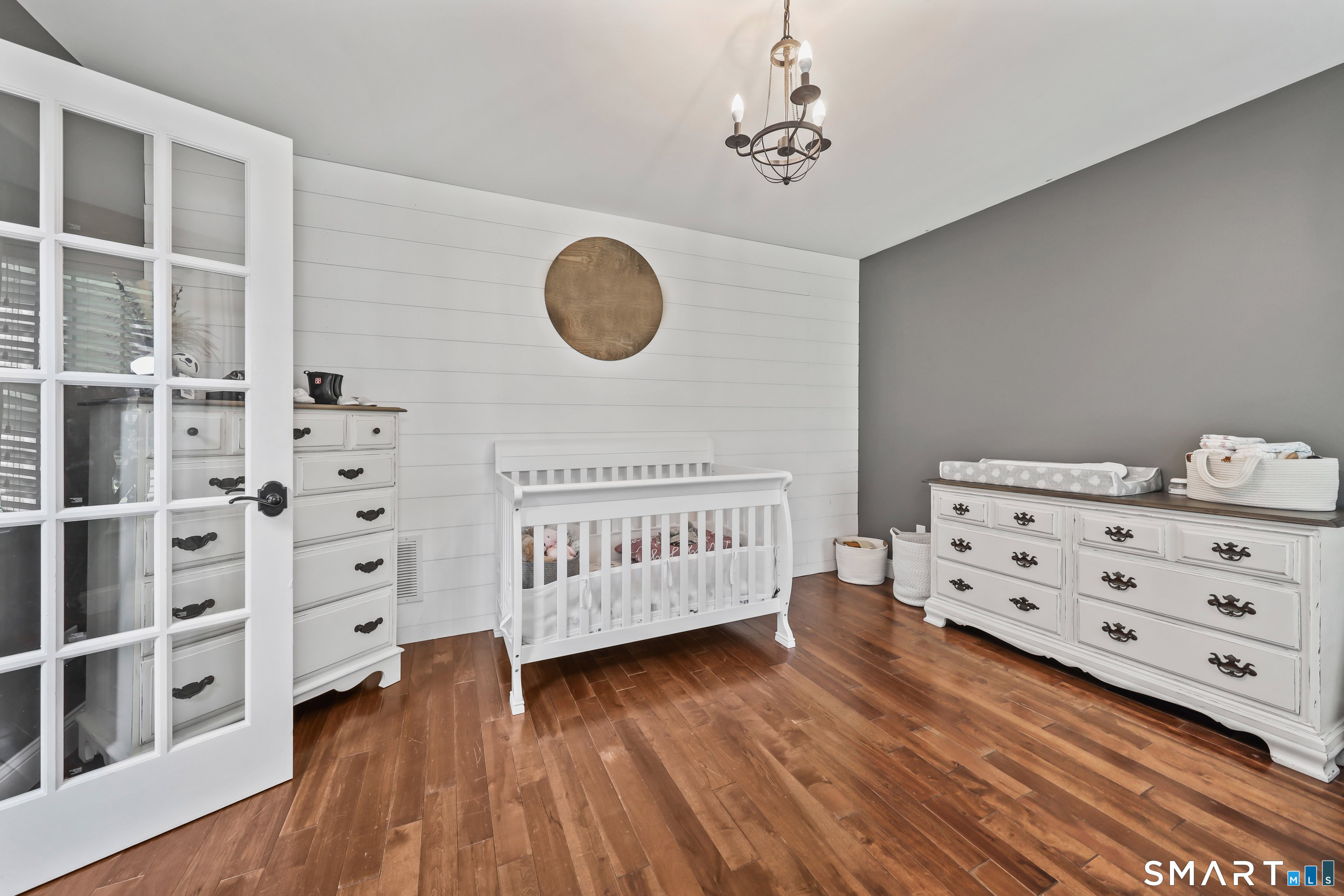 195 Hinman Road Watertown, CT 06795 - Photo 21 of 39 a view of a bedroom with furniture and wooden floor