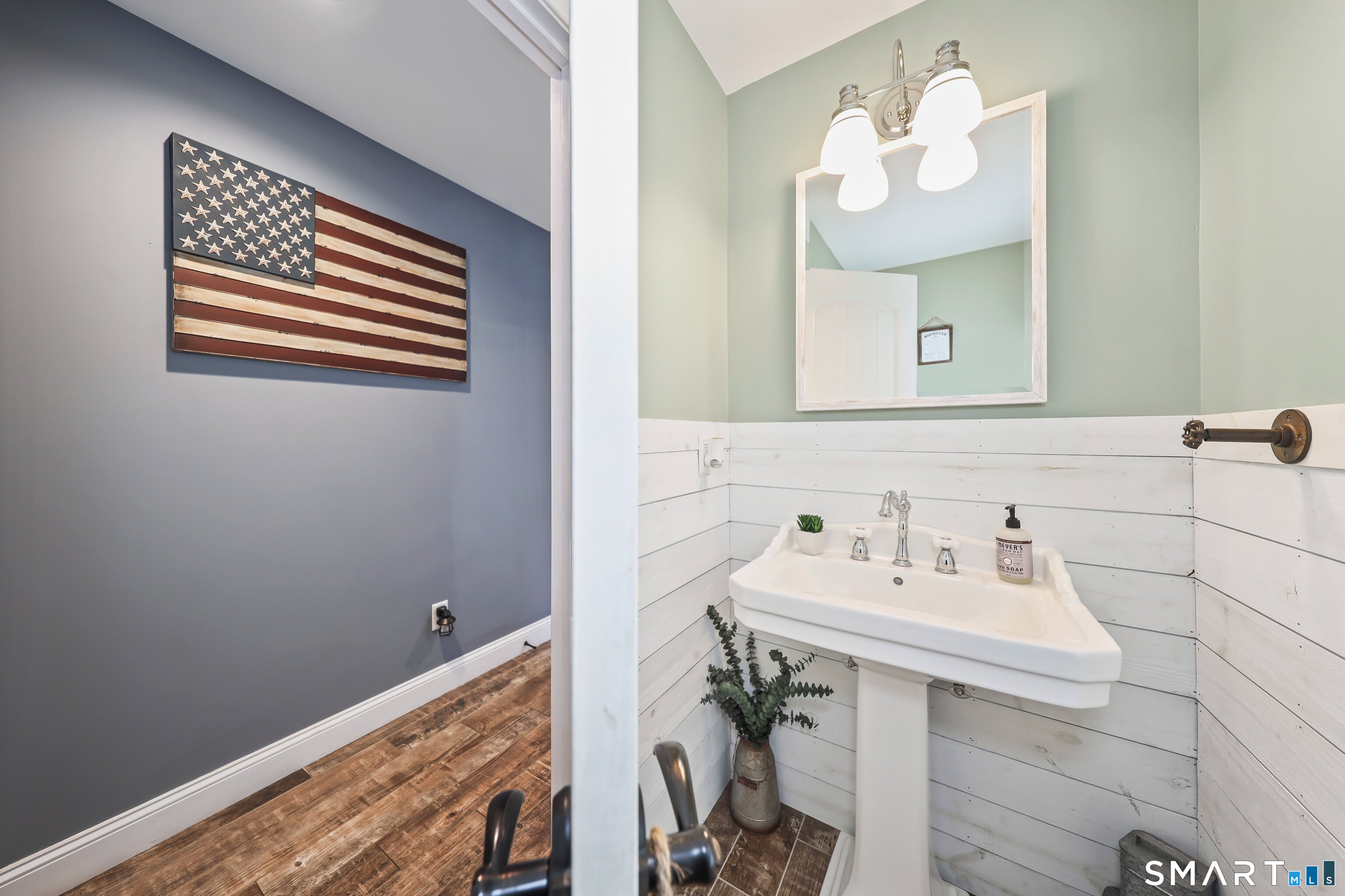 195 Hinman Road Watertown, CT 06795 - Photo 24 of 39 a bathroom with a sink a mirror and a vanity