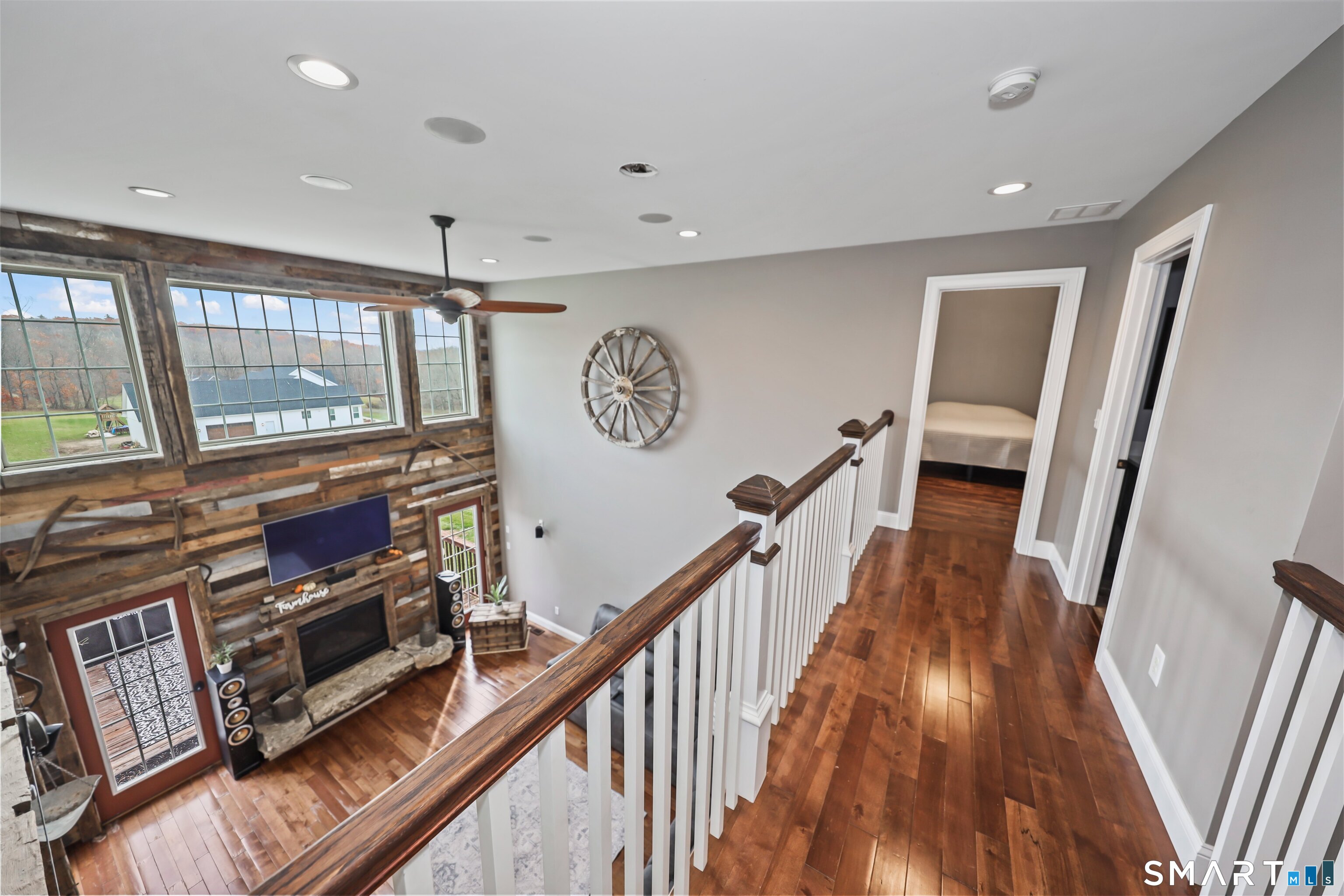 195 Hinman Road Watertown, CT 06795 - Photo 25 of 39 a view of a hallway with furniture and a large window