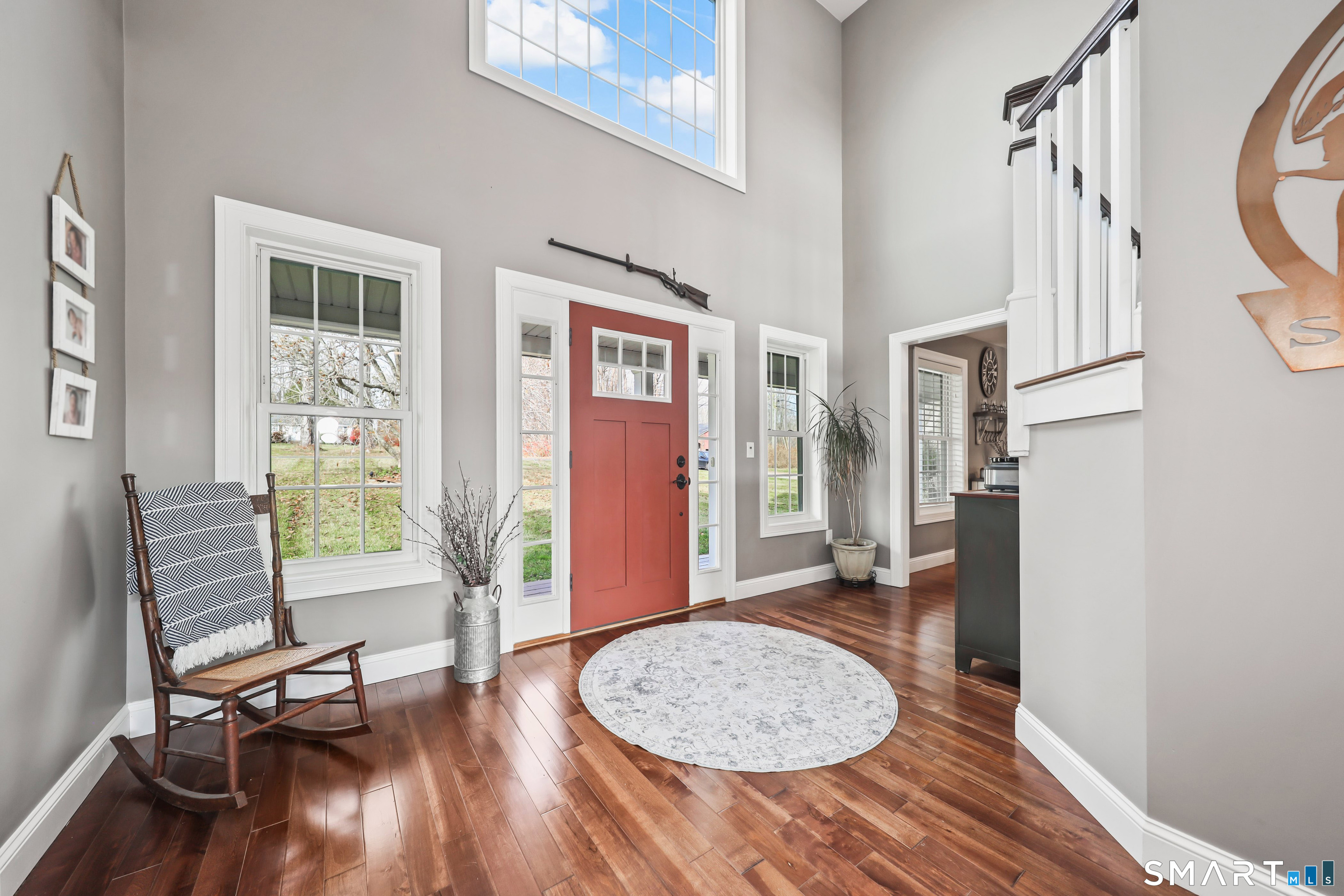 195 Hinman Road Watertown, CT 06795 - Photo 6 of 39 a view of a livingroom with furniture and wooden floor