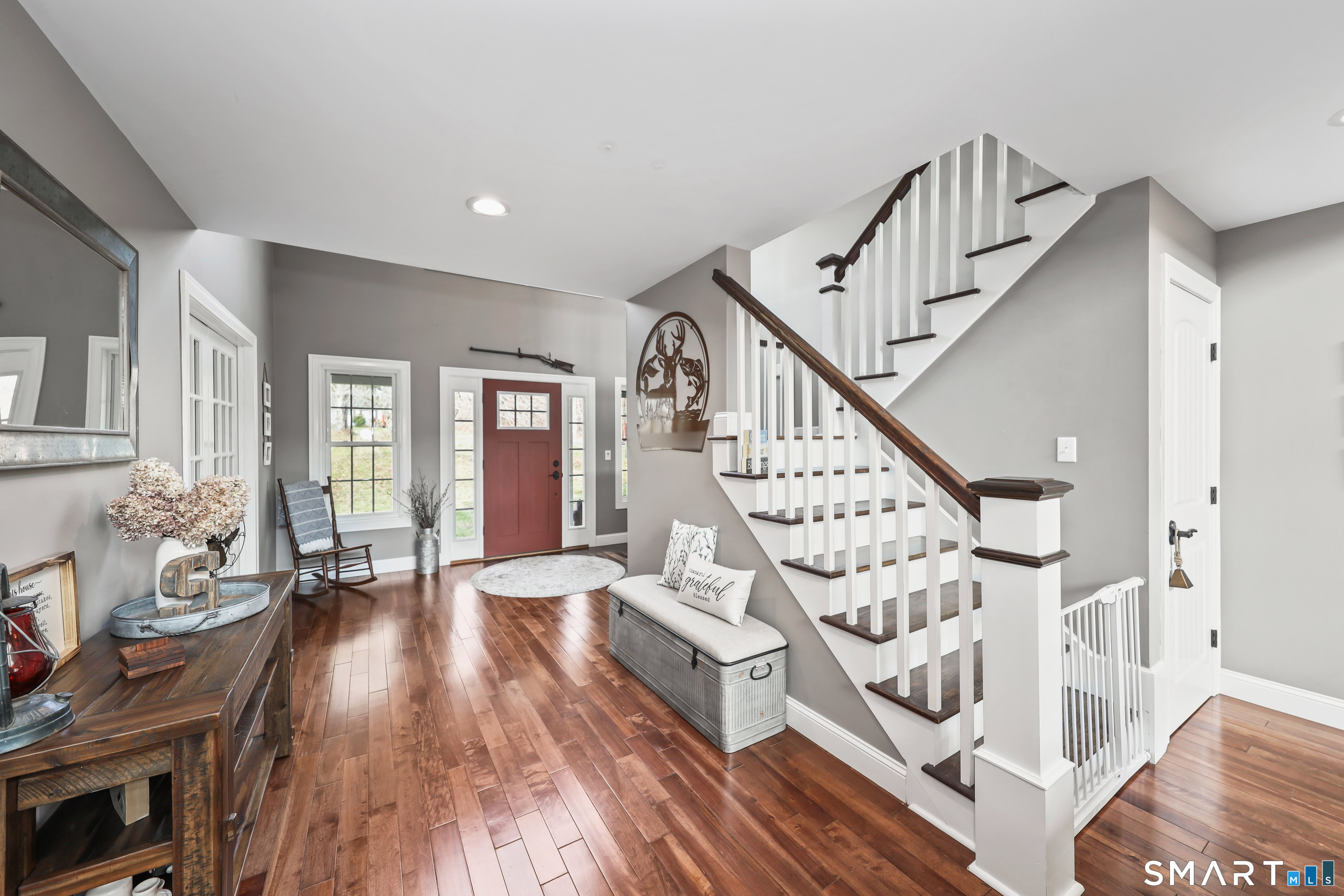 195 Hinman Road Watertown, CT 06795 - Photo 7 of 39 a view of an entryway with wooden floor and windows