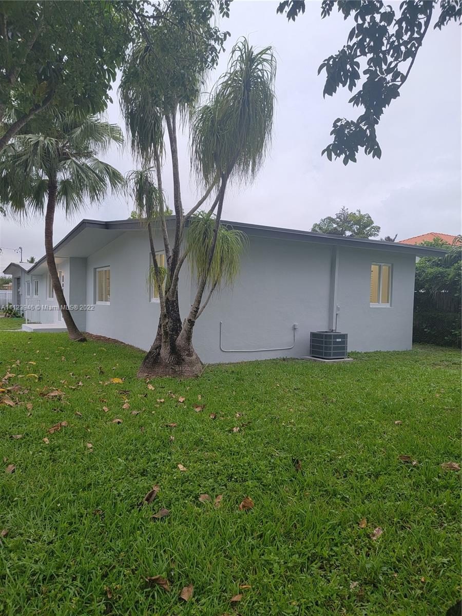 6501 Southwest 34th Street Miami, FL 33155 - Photo 57 of 62 a view of a house with a yard