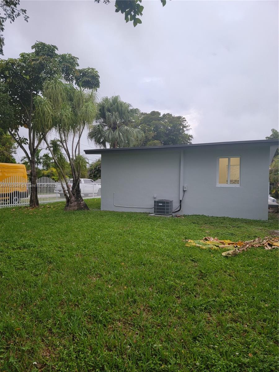 6501 Southwest 34th Street Miami, FL 33155 - Photo 60 of 62 a view of a backyard with plants and a garden