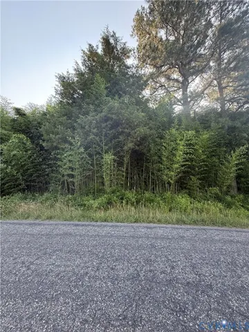 a view of a lake with a yard