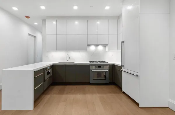 a picture of a bathroom with a shower