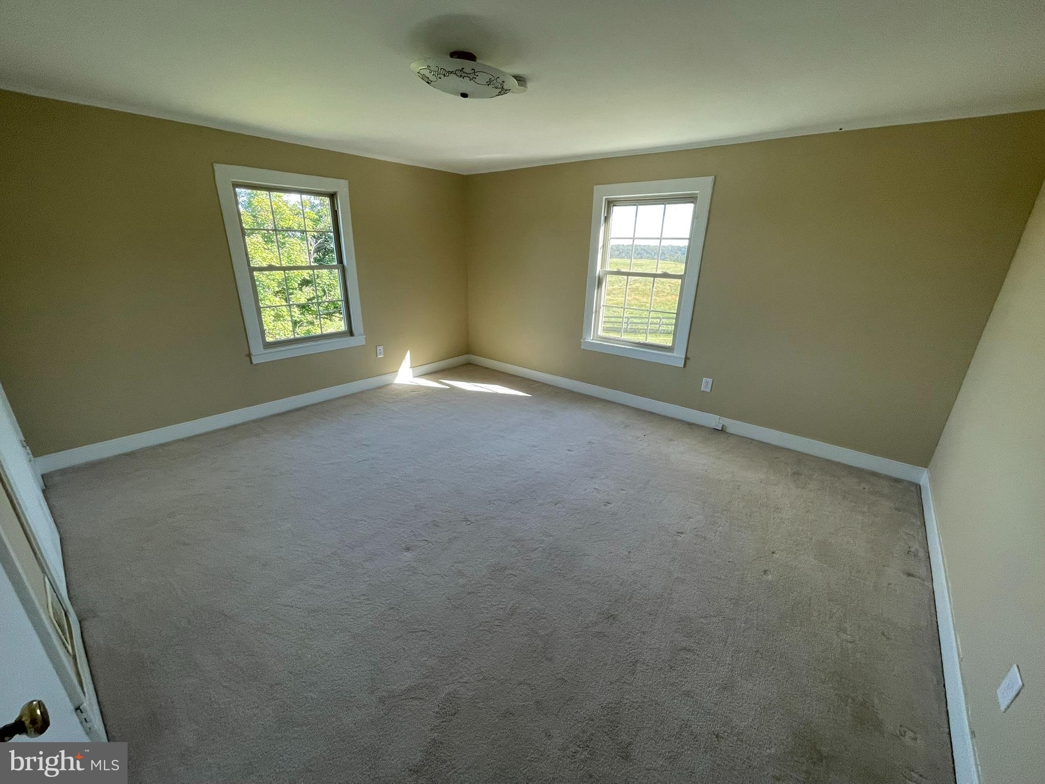 1079 Greystone Road Upperville, VA 20184 - Photo 17 of 21 an empty room with windows