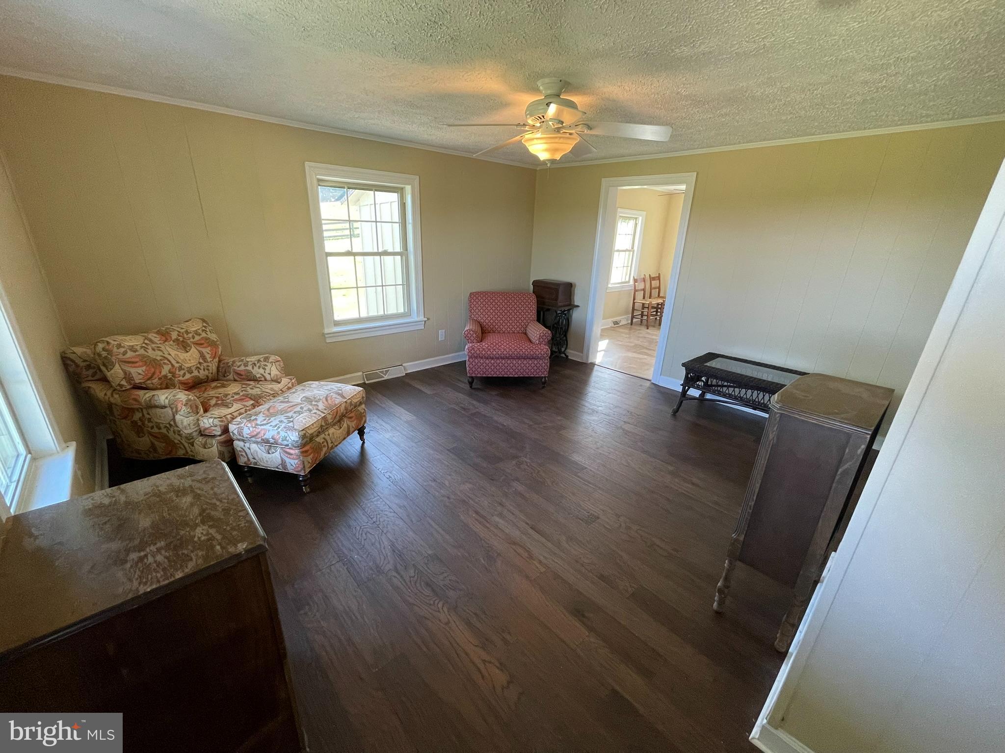 1079 Greystone Road Upperville, VA 20184 - Photo 8 of 21 a living room with furniture and a chandelier