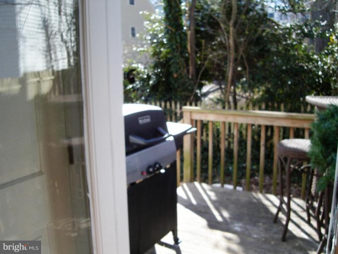 1544 Elm Road St. Leonard, MD 20685 - Photo 8 of 17 a balcony with wooden floor