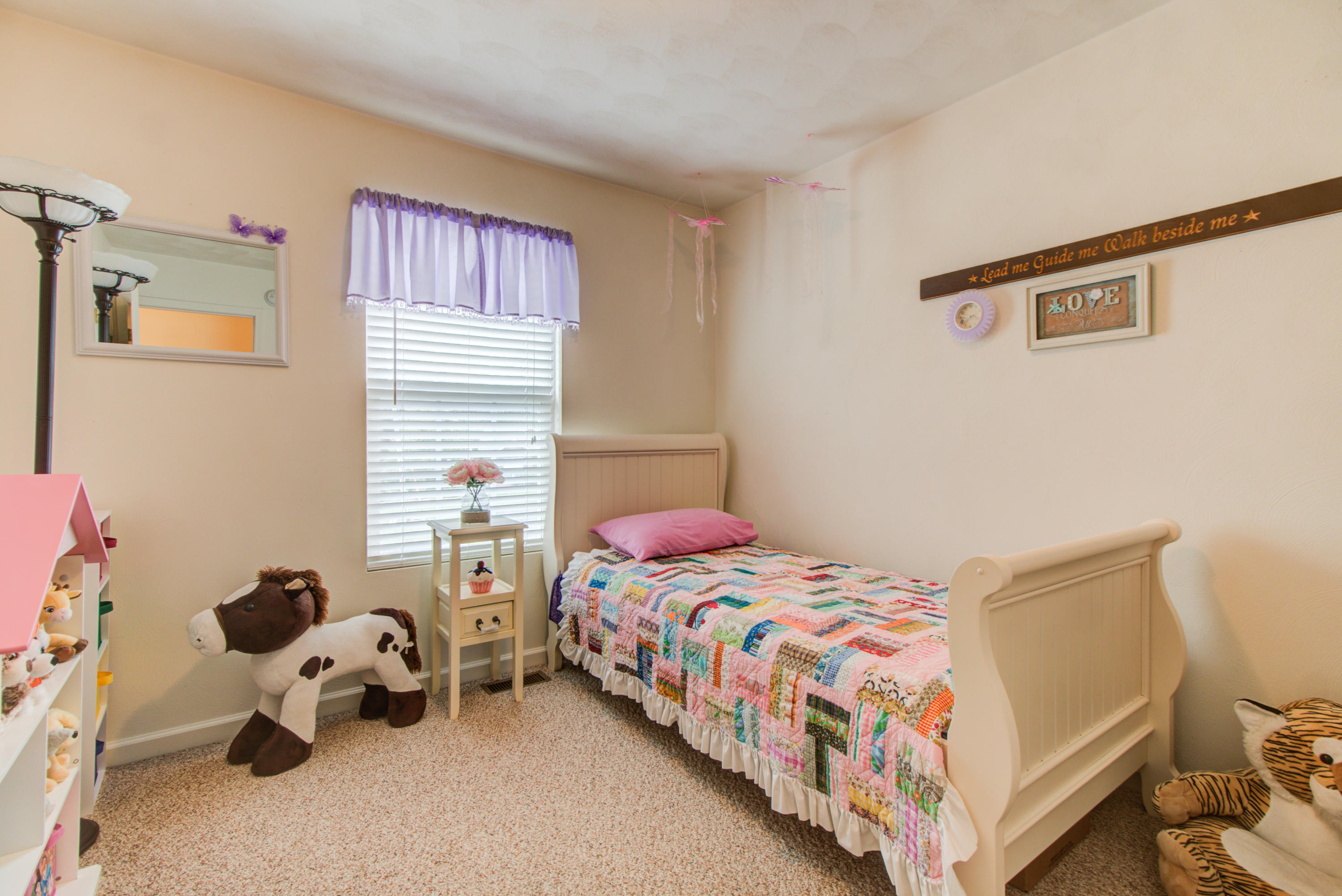 4169 Daugherty Road Salem, VA 24153 - Photo 14 of 28 a bedroom with a bed and a window
