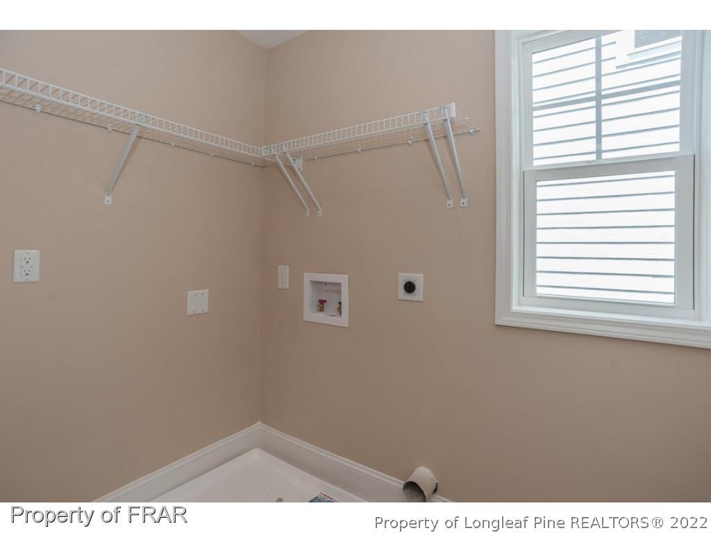350 Kerr Lake Road Aberdeen, NC 28315 - Photo 23 of 34 a view of an empty room with a window