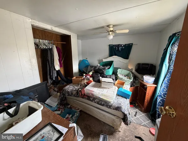 a bathroom with a sink toilet and a window