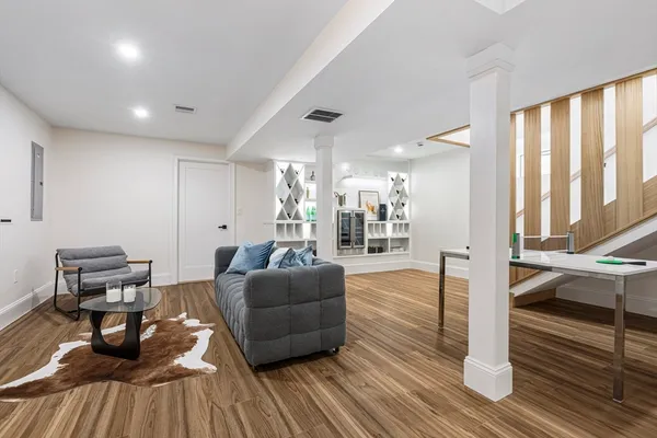 a living room with furniture and a table