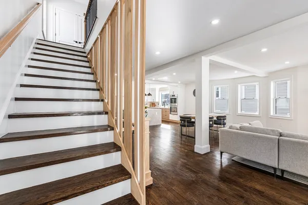 a view of a living room and entry way