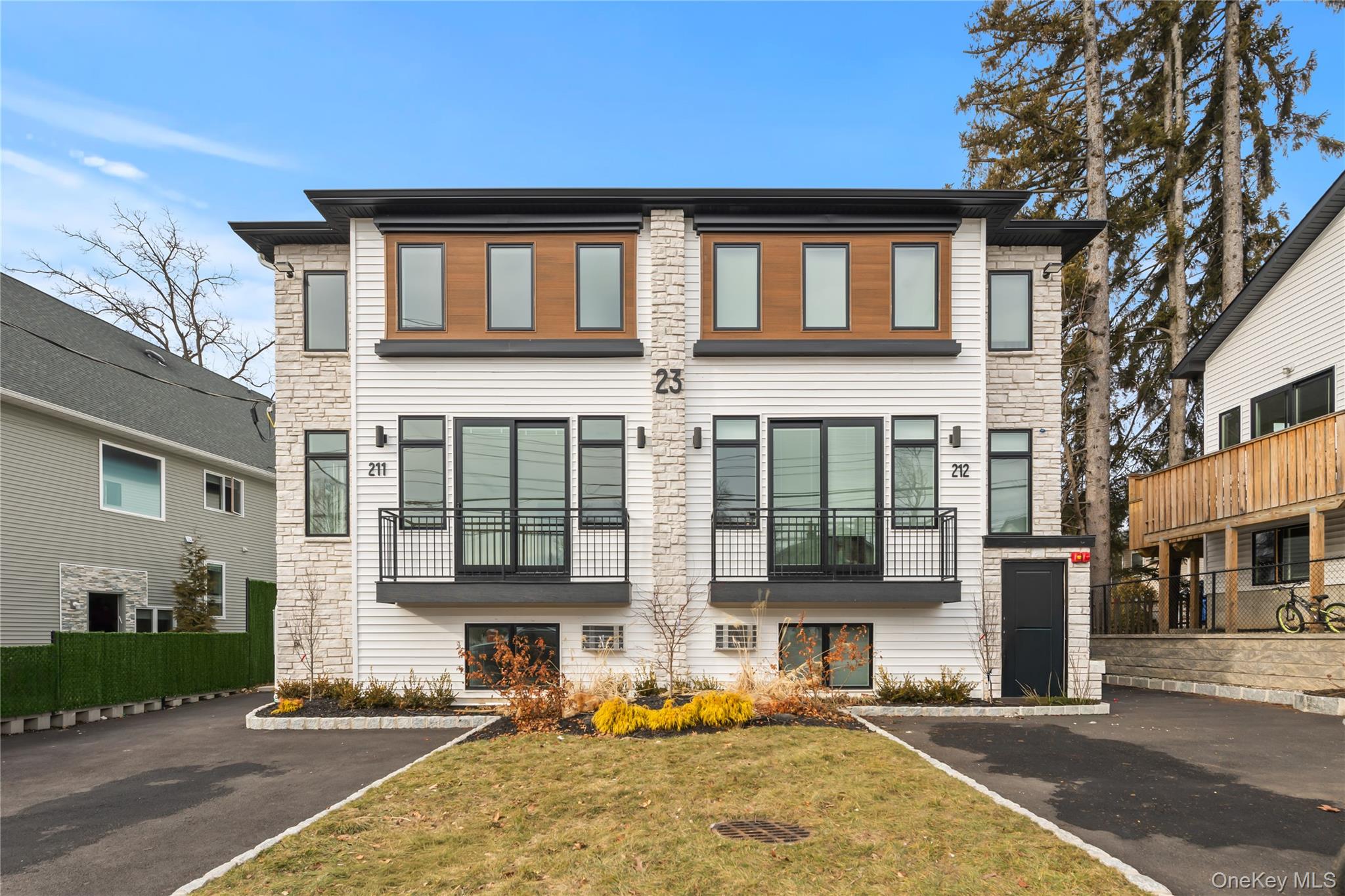 23 Singer Avenue, Unit 211 Spring Valley, NY 10977 - Photo 1 of 45 front view of a building