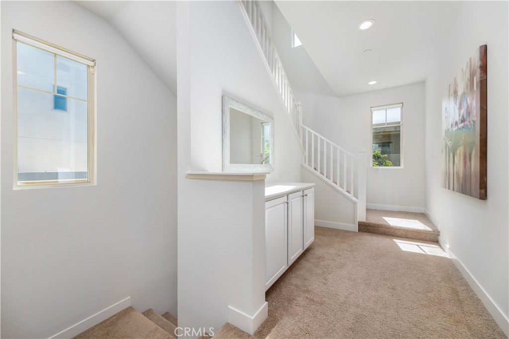 126 Interval Irvine, CA 92618 - Photo 13 of 47 wooden floor in an empty room with a window