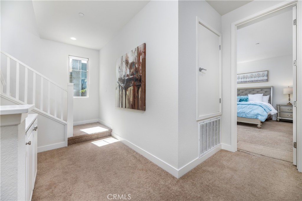126 Interval Irvine, CA 92618 - Photo 14 of 47 a view of a livingroom with entryway and furniture