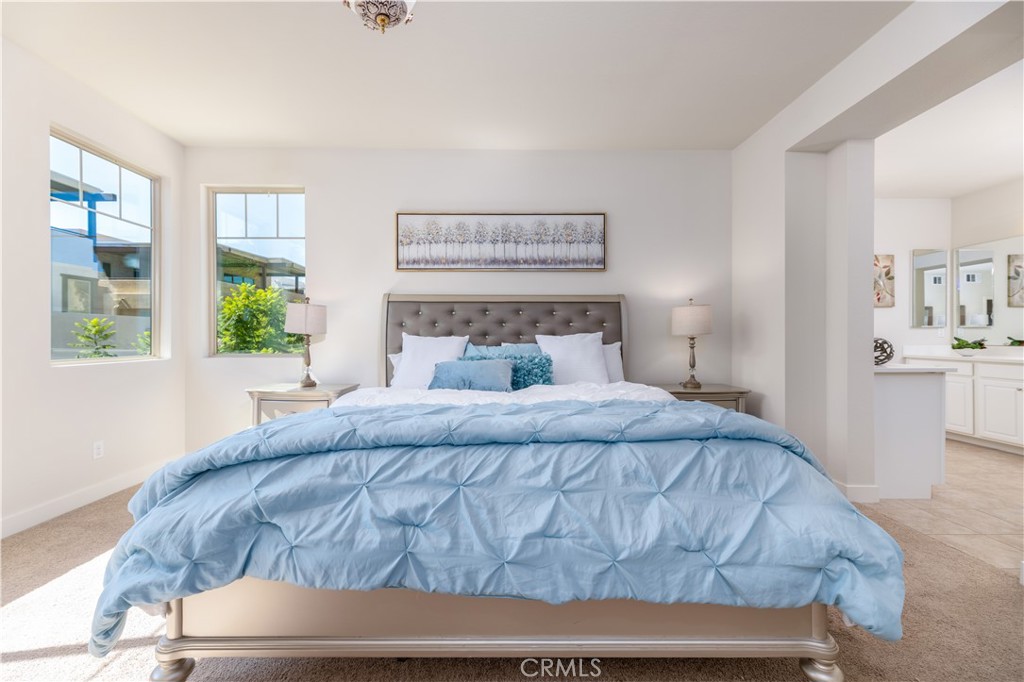 126 Interval Irvine, CA 92618 - Photo 16 of 47 a bedroom with a bed and window