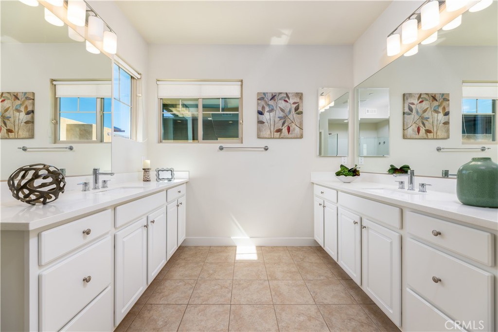 126 Interval Irvine, CA 92618 - Photo 20 of 47 a spacious bathroom with stainless steel appliances a sink and a cabinets