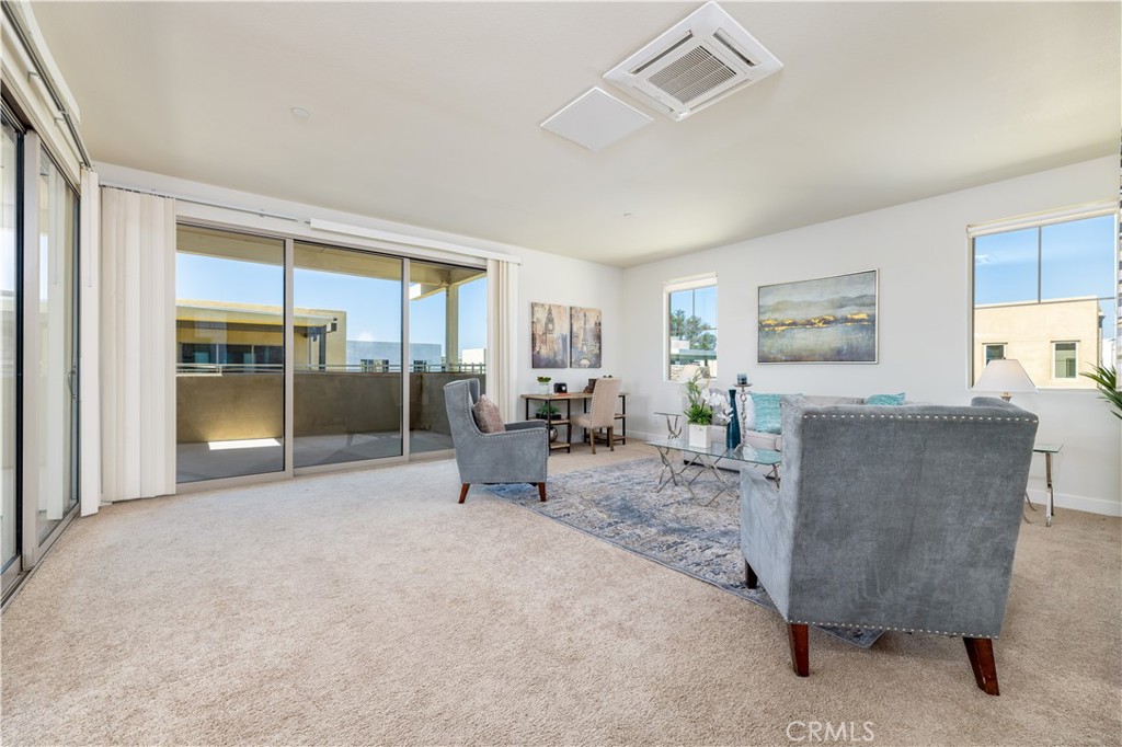 126 Interval Irvine, CA 92618 - Photo 27 of 47 a living room with furniture and large window