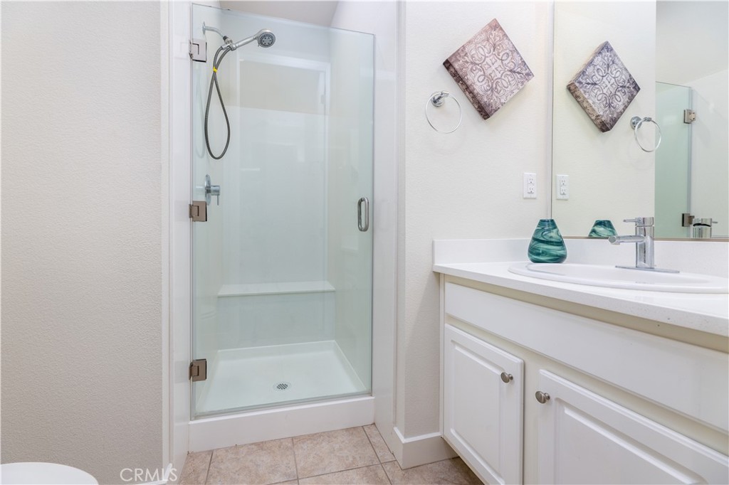 126 Interval Irvine, CA 92618 - Photo 4 of 47 a bathroom with a shower and a sink