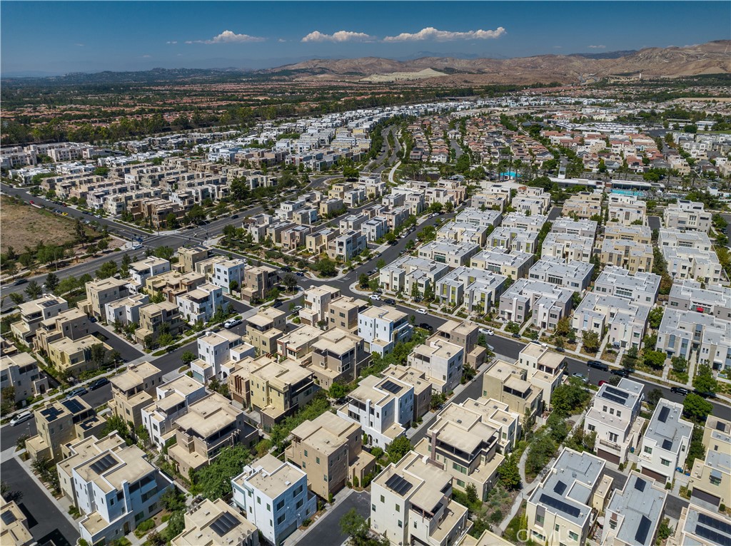 126 Interval Irvine, CA 92618 - Photo 44 of 47 an aerial view of residential building with parking