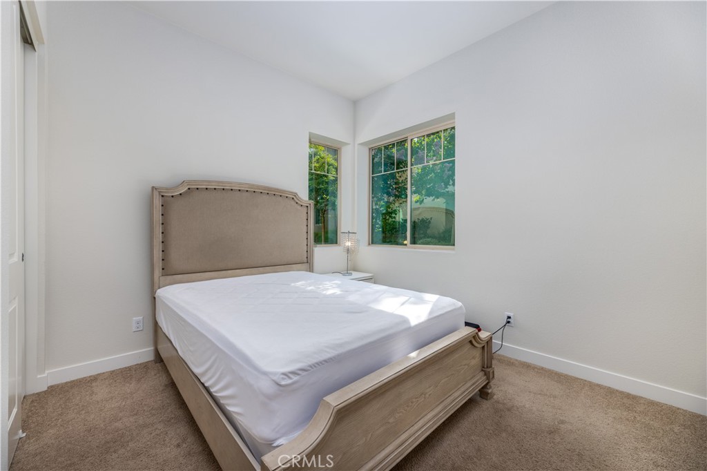 126 Interval Irvine, CA 92618 - Photo 5 of 47 a bedroom with a bed and window