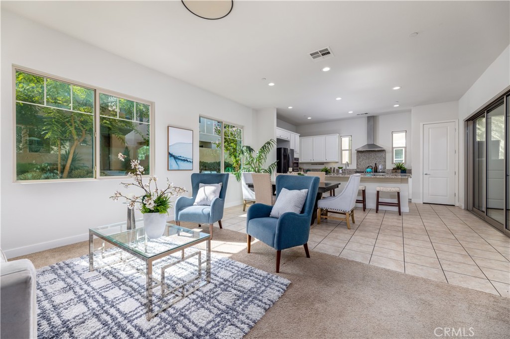 126 Interval Irvine, CA 92618 - Photo 6 of 47 a living room with furniture and a table
