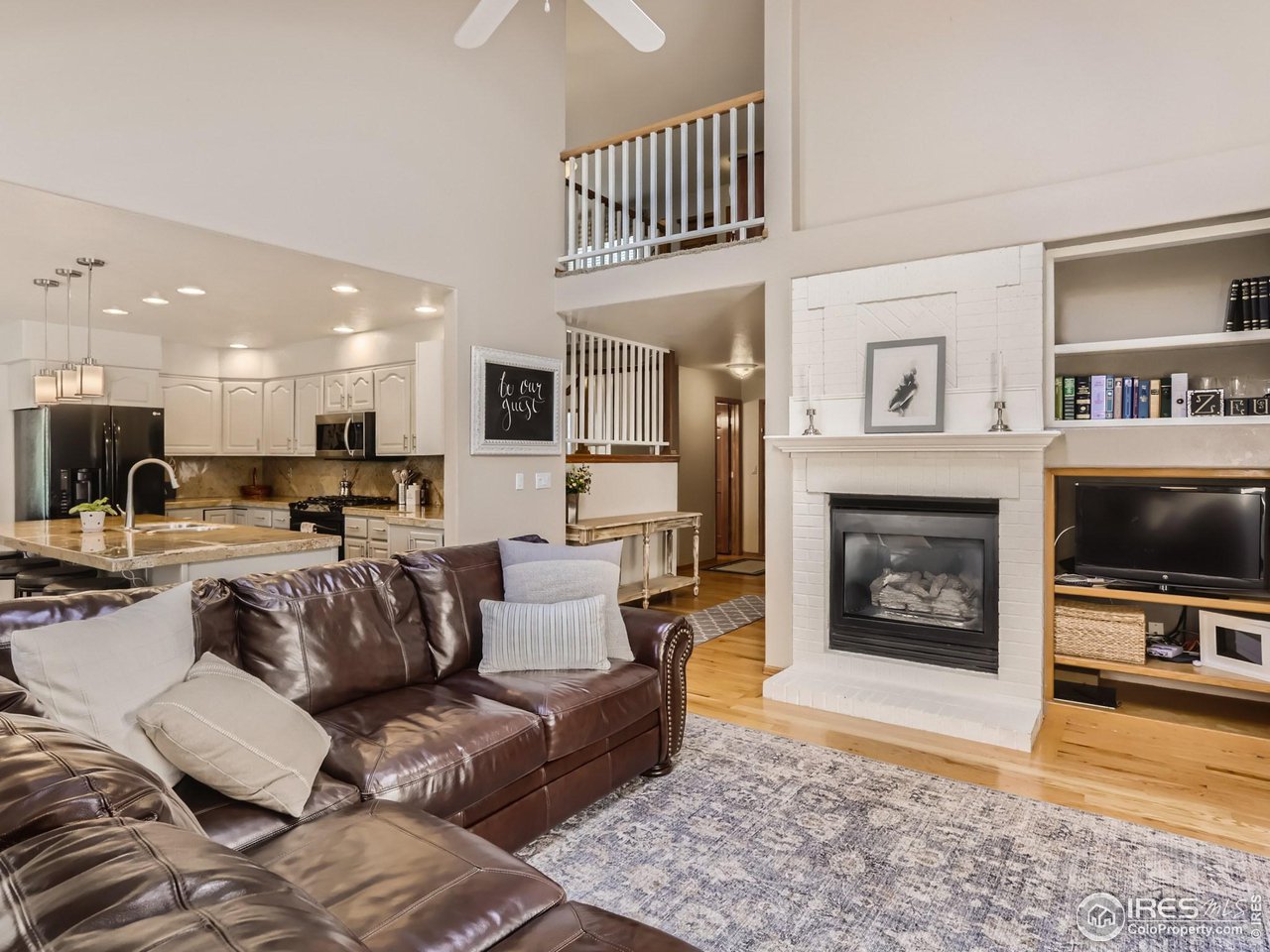 1752 Eldorado Drive Superior, CO 80027 - Photo 12 of 34 a living room with furniture and a fireplace